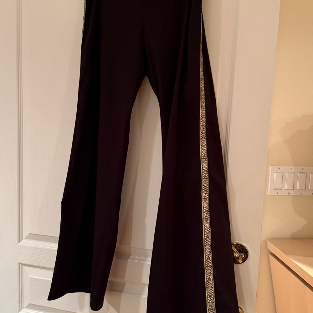 Aura Elegant Black Wide-Leg Pants with full length gold trim on both legs